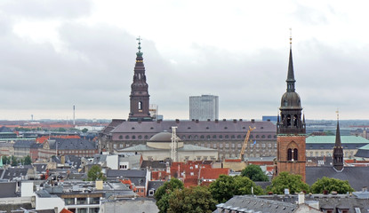 Cityscape, top view from the observation deck at the top of the Rundetaarn or Round Tower in old town, rainy day, Copenhagen, Denmark