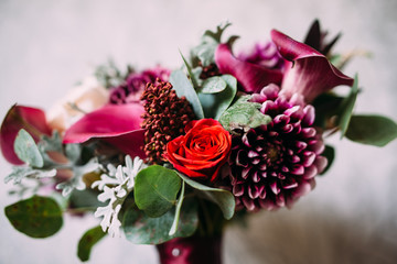 Purple wedding bouquet for the bride on her special day