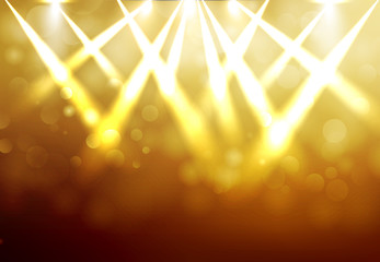 Shining Gold disco spotlights with blured bokeh on dark background. Vector