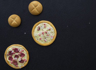 pizza toy on a black chalkboard