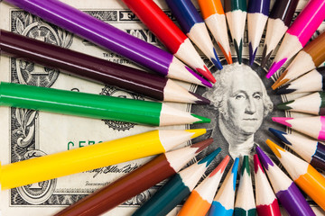 Color pencils around the Washington portrait close-up on the right side of the frame.