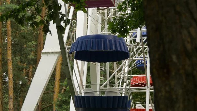 View Of The Attraction Ferris Wheel In Pine Forest Background Fast Speed