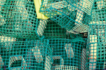 Lobster or crab pots stacked on jetty