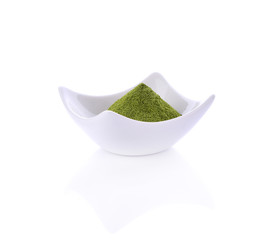 Green tea powder in bowl on white background