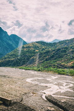 View of mountains Babadag and a muddy river Girdimanchay Lahij yolu from the side in Lahic village, Azerbaijan