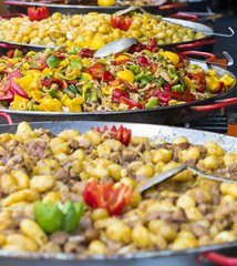 Street food at the festival in Hungary fried stews with meat and vegetables