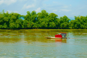 Fototapeta na wymiar Fishing boat on the river