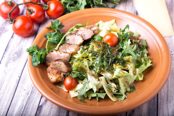 Fresh Tasty meat  salad with vegetables and cheese.
