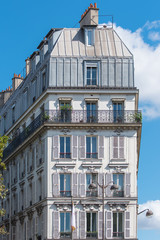 Fototapeta na wymiar Paris, attractive facades in Bastille, with geometry of the windows, charming typical building 