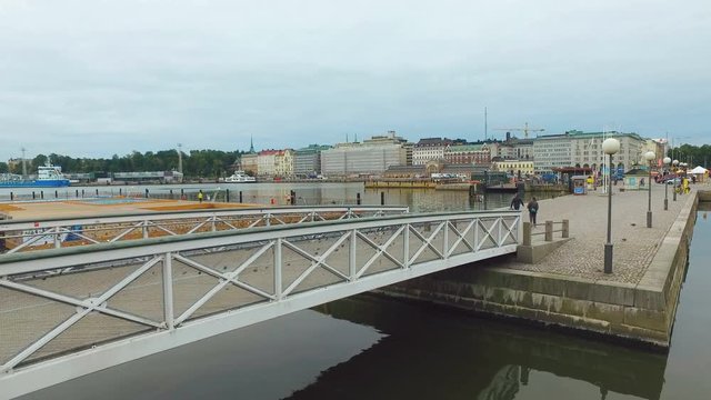 low cloudy sky over picturesque harbor in centre of Helsinki, early morning in summer day