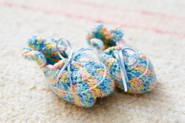 Fototapeta na wymiar Knitted baby socks