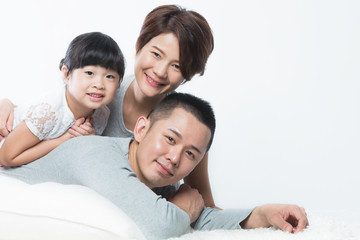 Young happy Asian family