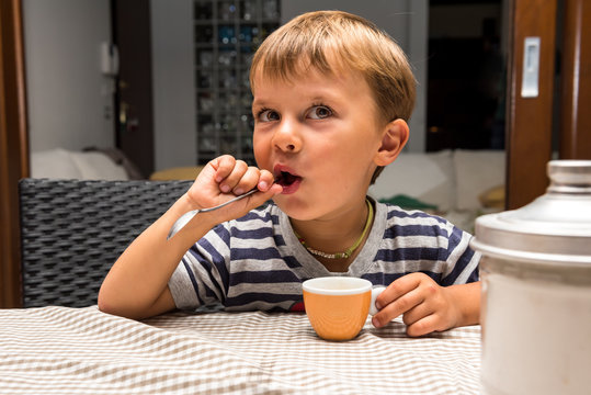 Young Kid Having Coffee