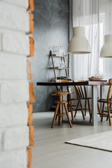 Dining room with dark wall