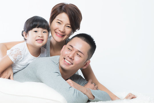 Young happy Asian family
