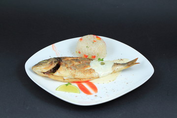 Baked fish. Elegant serving.