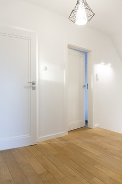 Cozy hallway with white walls