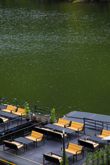 Outdoor table and chair near river 