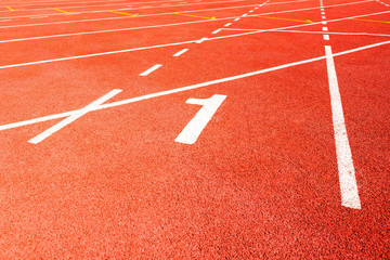 number one in red  running track on the athletic stadium