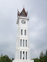 Jam Gadang, Bukittinggi white clock tower in central Bukittinggi, a city in the Minangkabau Highlands of West Sumatra. It sits in the middle of the Sabai Nan Aluih Park.