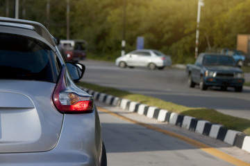 Fototapeta premium Cars on the road heading towards the goal of the trip. tourism And Race car.