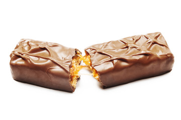 Closeup of chocolate,peanut and caramel bar isolated on white