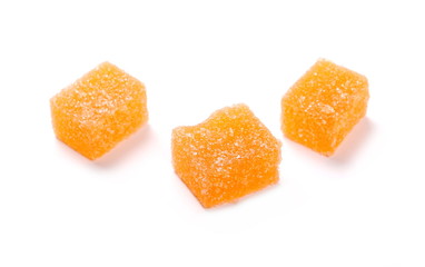 Orange jelly sugar candies isolated on white background 