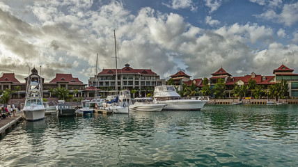 Fototapeta na wymiar A few luxury yachts at the berth of Eden island, Seychelles