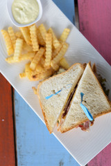 Sandwich ham cheese on vintage wooden table background,top view