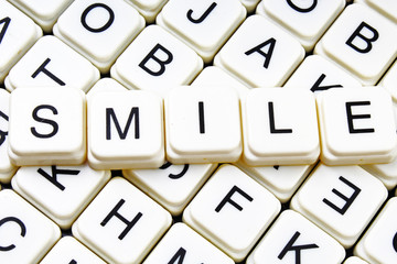 Smile text alphabet word by letters. Letter blocks crossword 