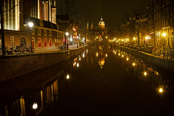 Amsterdam in the bright lights of the night city