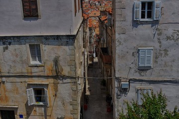 street between two old buildings 