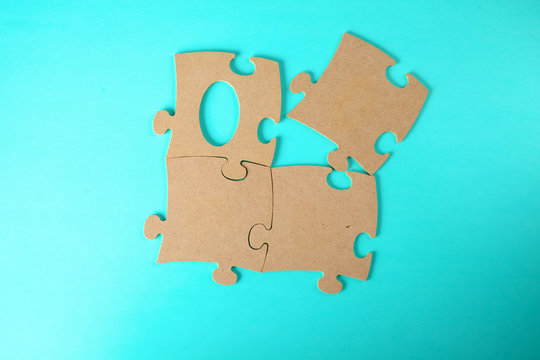 puzzles close-up lie on a blue table