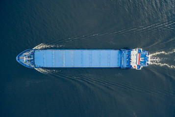 Aerial view of general cargo ship in open sea