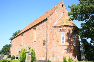 Fototapeta na wymiar Historic church in Wiefels, Ostfriesland, Lower Saxony, Germany