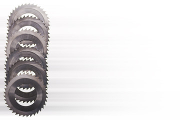  Carbide Saws Stacked vertically on a light background