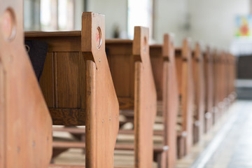Pews in an old church.