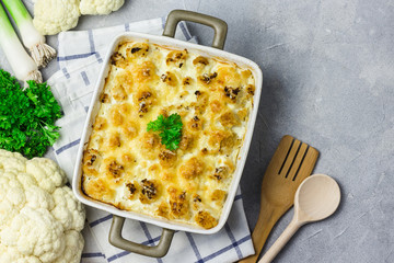 Loaded vegetable casserole with broccoli, cauliflower and leek. Top view, space for text.  