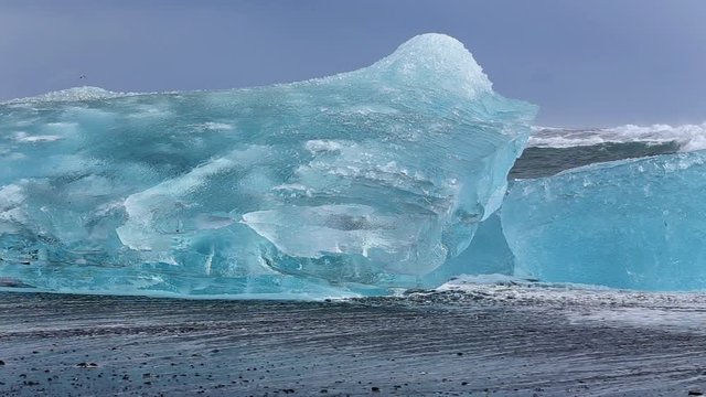 Large blue ice floes in the Jikulsarlon Lagoon in Iceland
