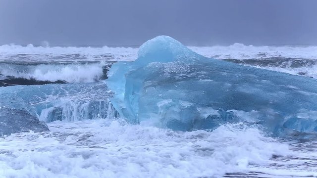 Large blue ice floes in the Jikulsarlon Lagoon in Iceland
