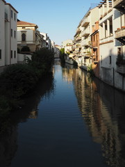 Fototapeta na wymiar Padua, Italy. Houses and canal.