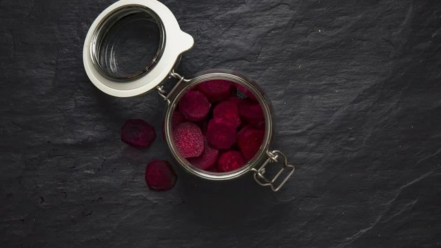 Process of preparing natural fermented beetroot, step by step. Stop motion animation, top view