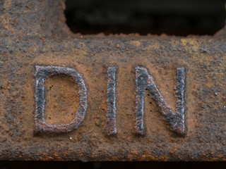 DIN standard sign on rusty metal