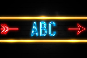 Obraz premium Abc - fluorescent Neon Sign on brickwall Front view