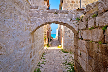Narrow stone mediterranean street in Prvic Sepurine village