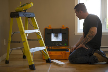 ventilation cleaner man at work with tool