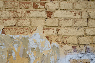 Yellow brick wall background.Home repair. 