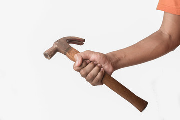 hand and Hammer strike nail on isolated background