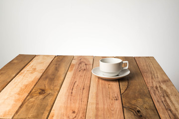cup coffe on wood table  isolated background.