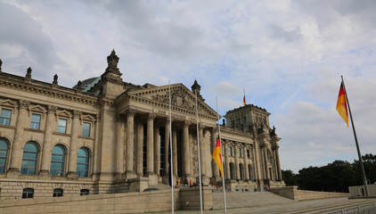 Fototapeta na wymiar Reichstag building is Parliament of Germany in Berlin with big f